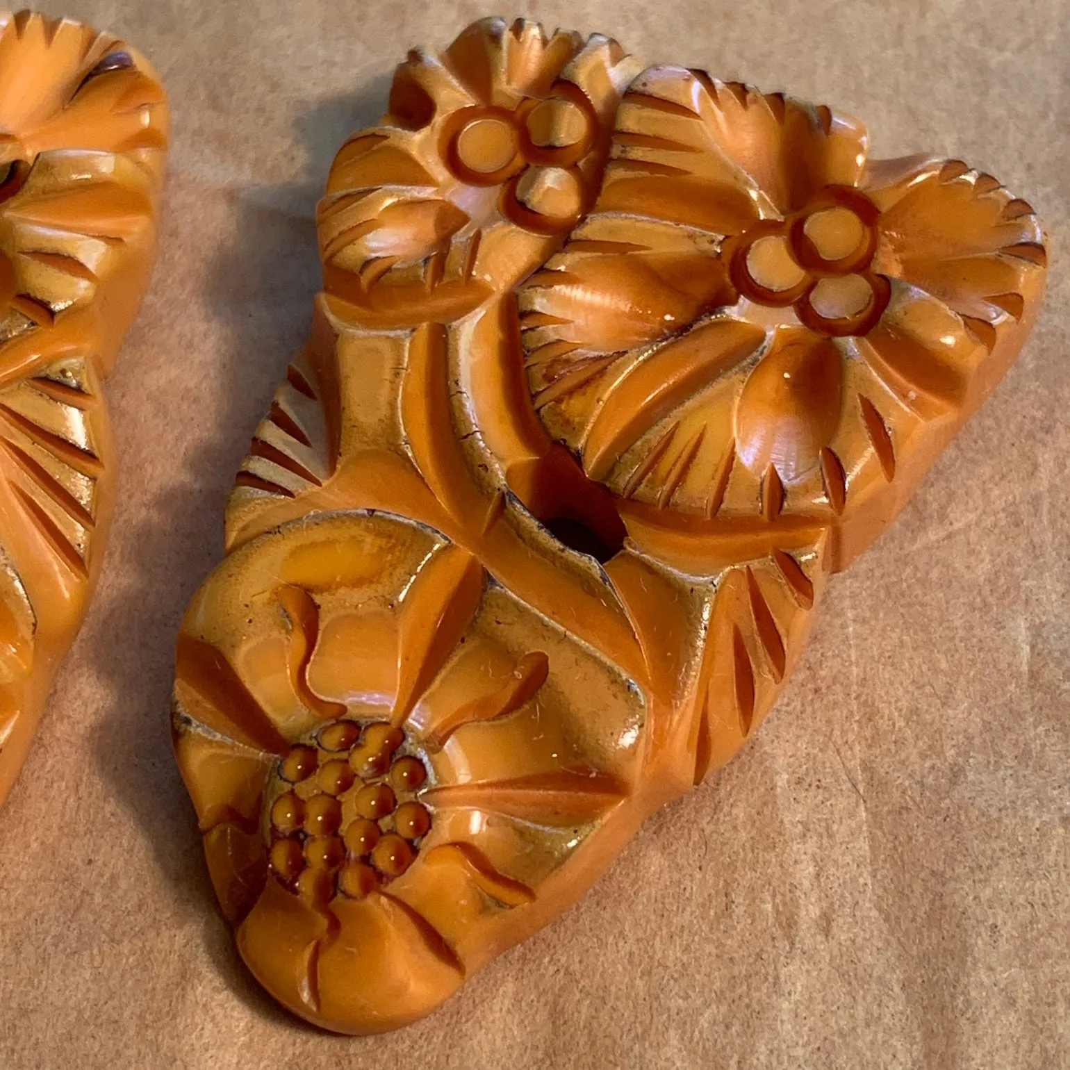 Carved Yellow Bakelite Shoe Clips